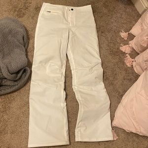 Woman’s white ski pants